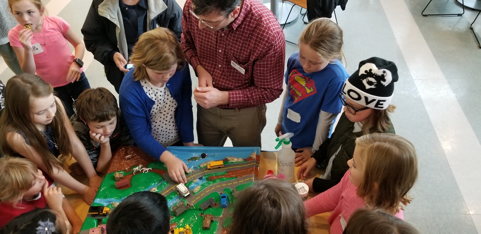 Students with Enviroscape watershed model