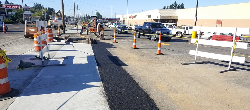 Sidewalk construction on the west side of Highway 99, south of Northeast 78th Street.