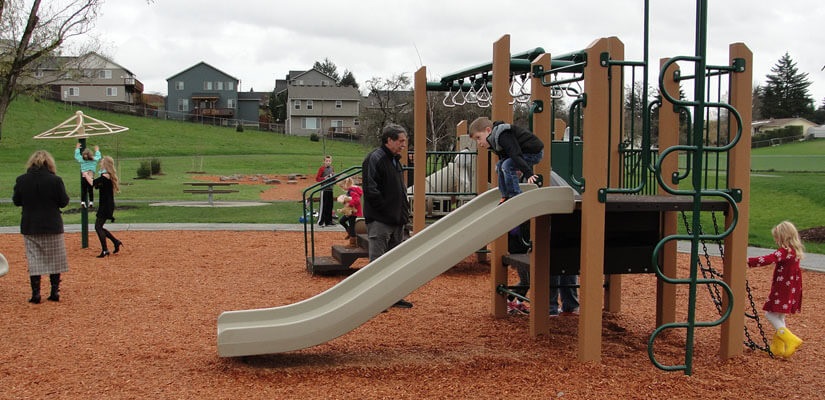 Children enjoy the main playground at Sorenson Neighborhood Park. Children enjoy the main playground at Sorenson Neighborhood Park.