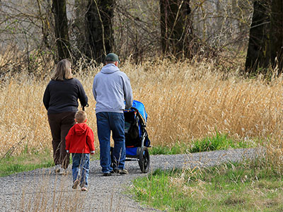 Family walking on trail in Battle Ground