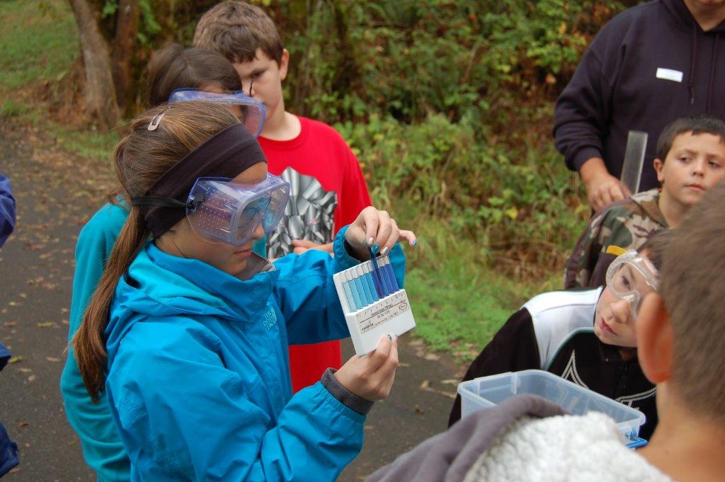 Student Using Water Quality test kit Student Using Water Quality test kit